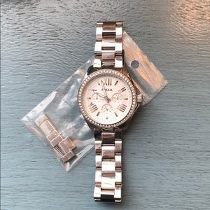 Silver Fossil watch (women’s)